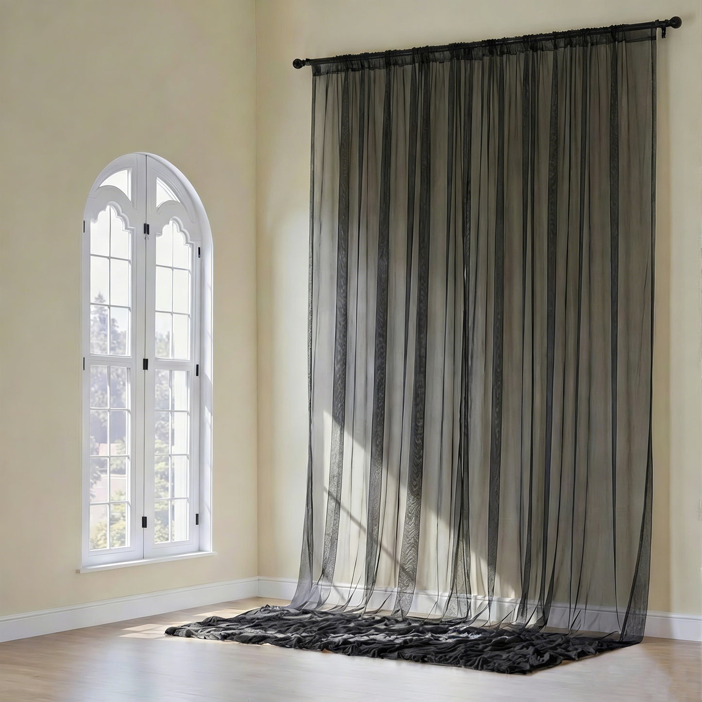 Black chiffon curtain panel, durable flame-resistant backdrop drape.