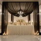 Black chiffon curtain panel backdrop and ceiling drape.