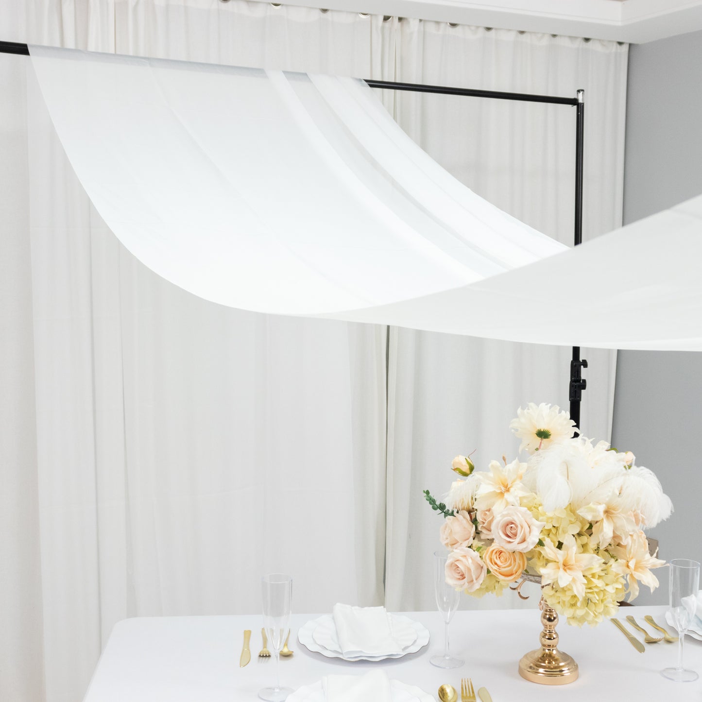 Ivory chiffon curtain panel backdrop drape with rod pocket.