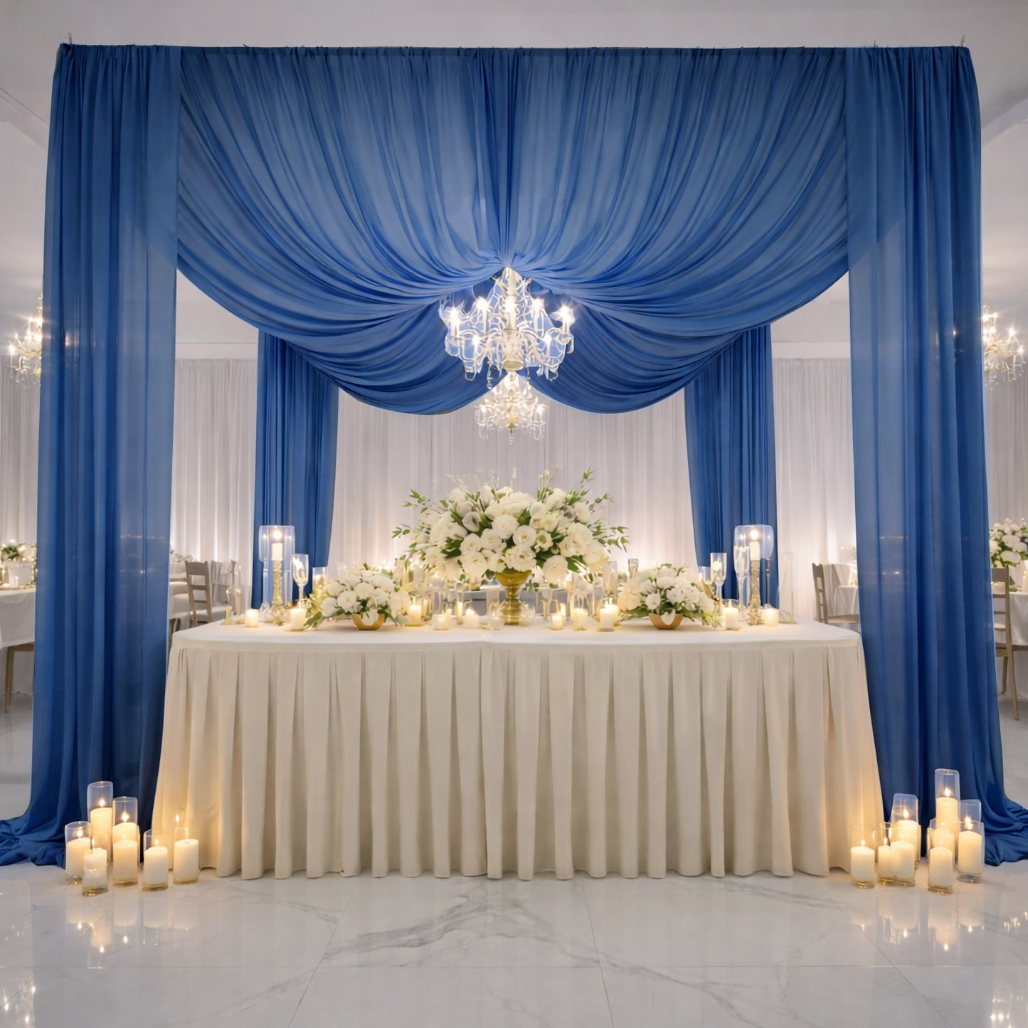 Navy blue chiffon curtain panel backdrop with elegant floral arrangement and candles.