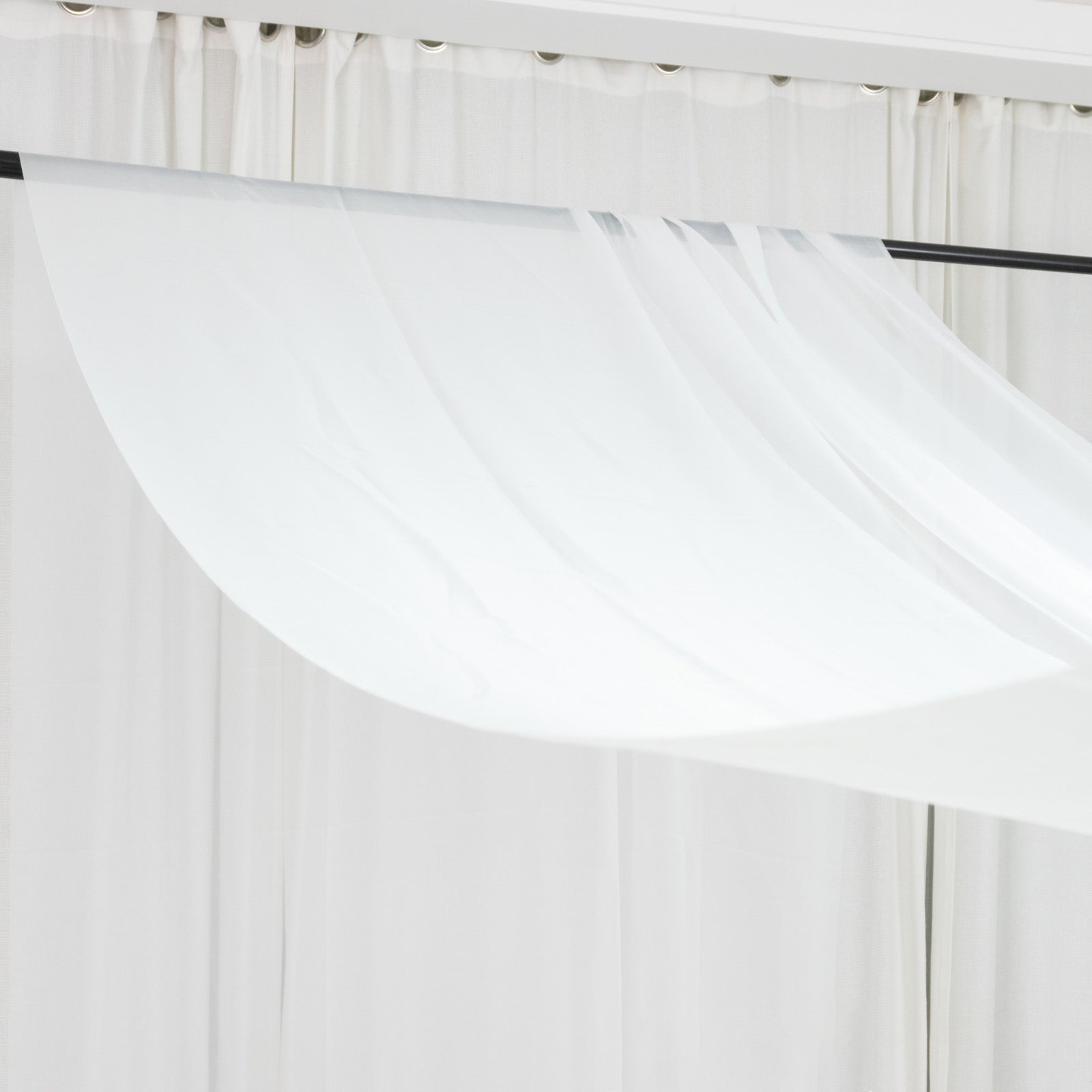 White chiffon curtain panel, durable flame resistant backdrop and ceiling drape.