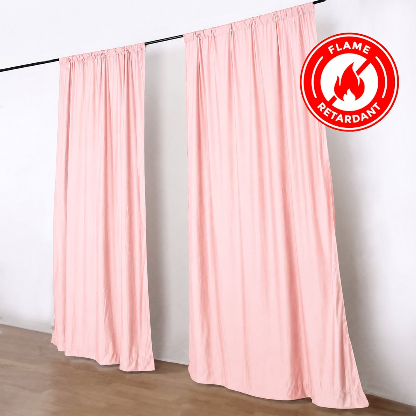 Blush polyester backdrop drape curtains for events, wrinkle-free and flame resistant.