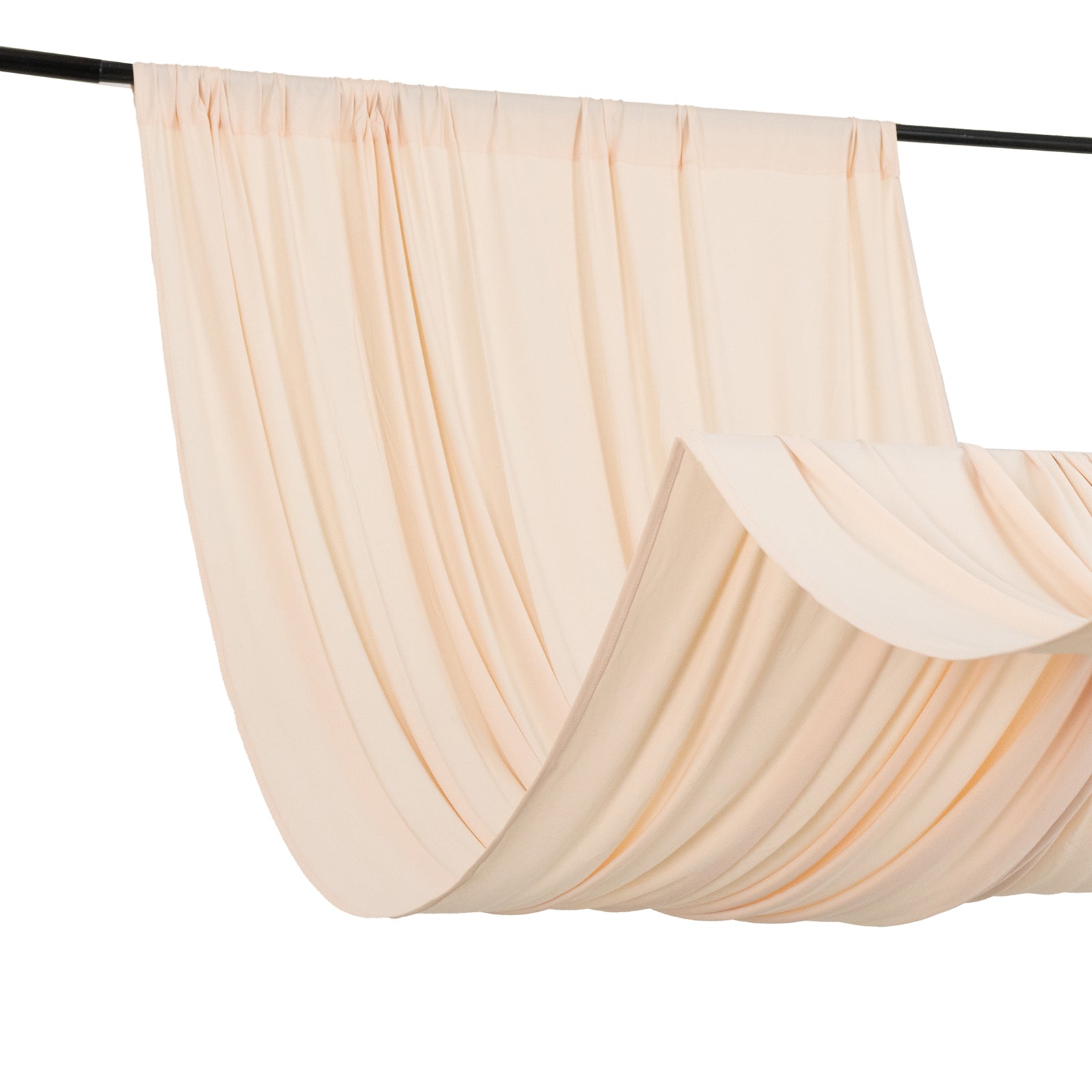 Blush 4-way stretch spandex event curtain drapes hanging elegantly.