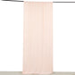 Blush 4-way stretch spandex event curtain drapes hanging on a rod.