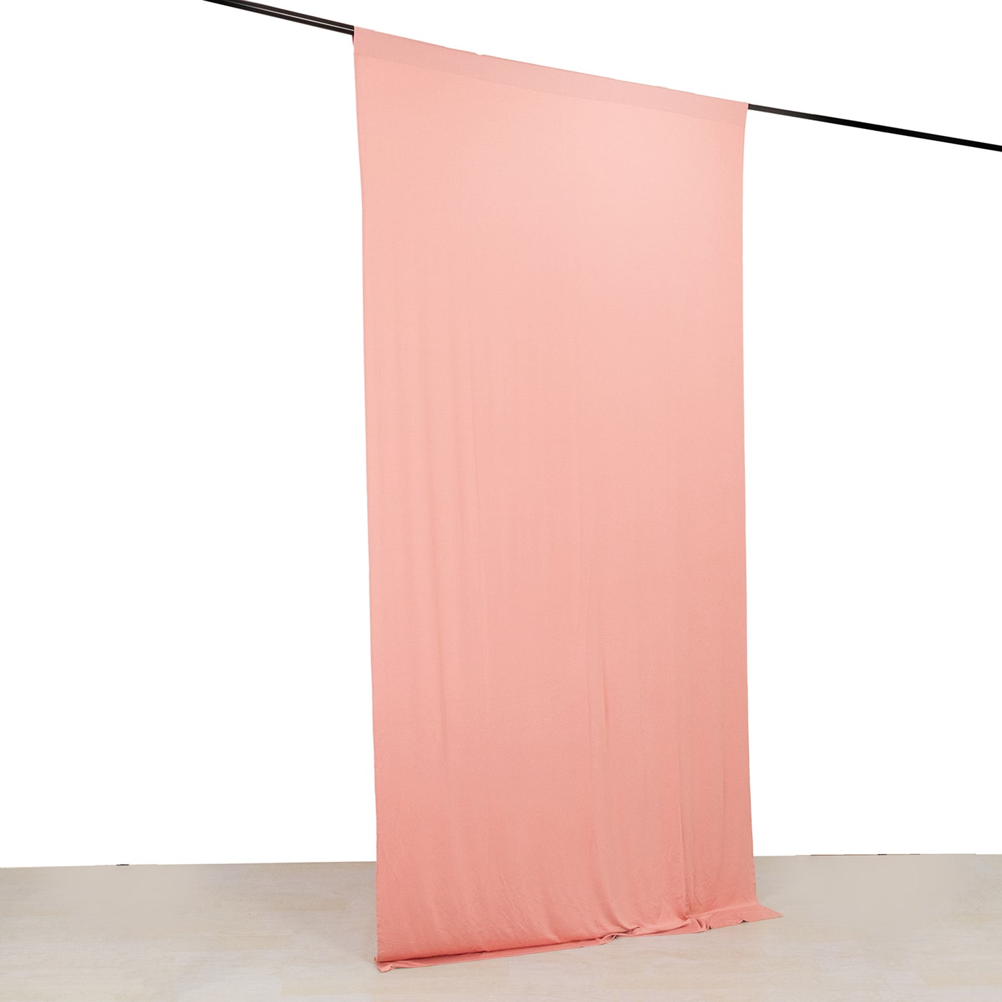 Dusty rose 4-way stretch spandex event curtain drape with rod pockets.