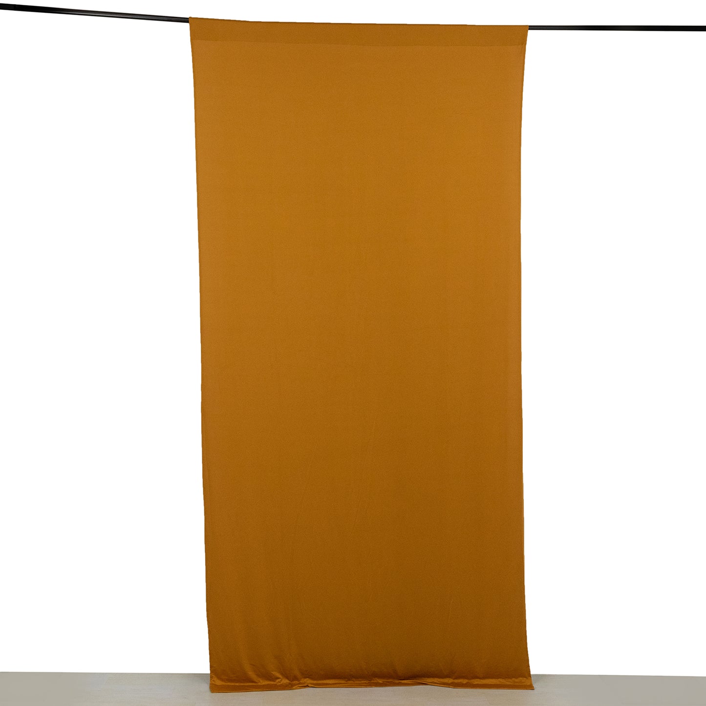 Gold 4-way stretch spandex event curtain drape, wrinkle-free backdrop.