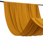 Gold 4-way stretch spandex event curtain drapes on a rod.