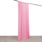 Pink 4-way stretch spandex event curtain drapes on a rod.