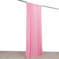 Pink 4-way stretch spandex event curtain drapes on a rod.