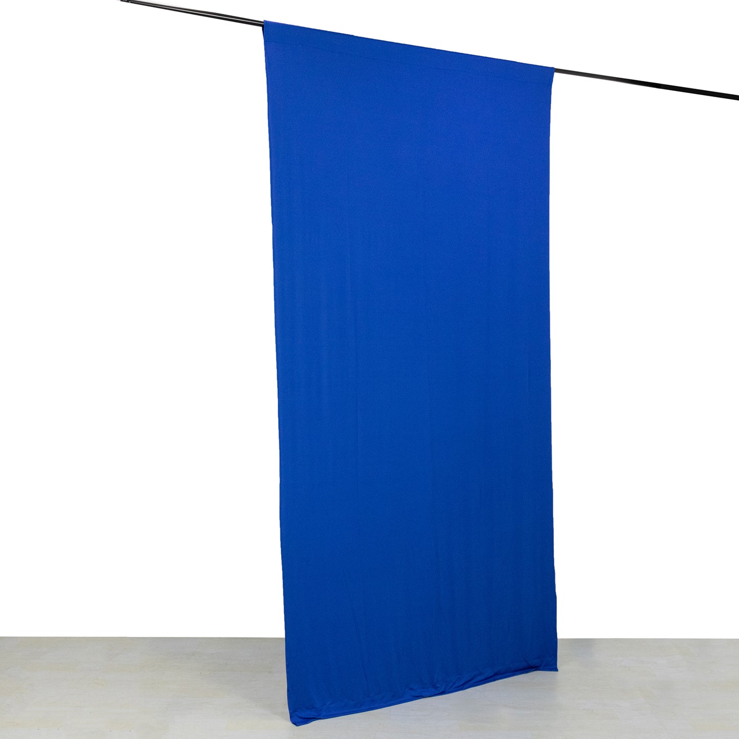 Royal Blue 4-Way Stretch Spandex Event Curtain Drapes on a rod.