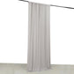 Silver 4-way stretch spandex event curtain drapes hanging on a rod.