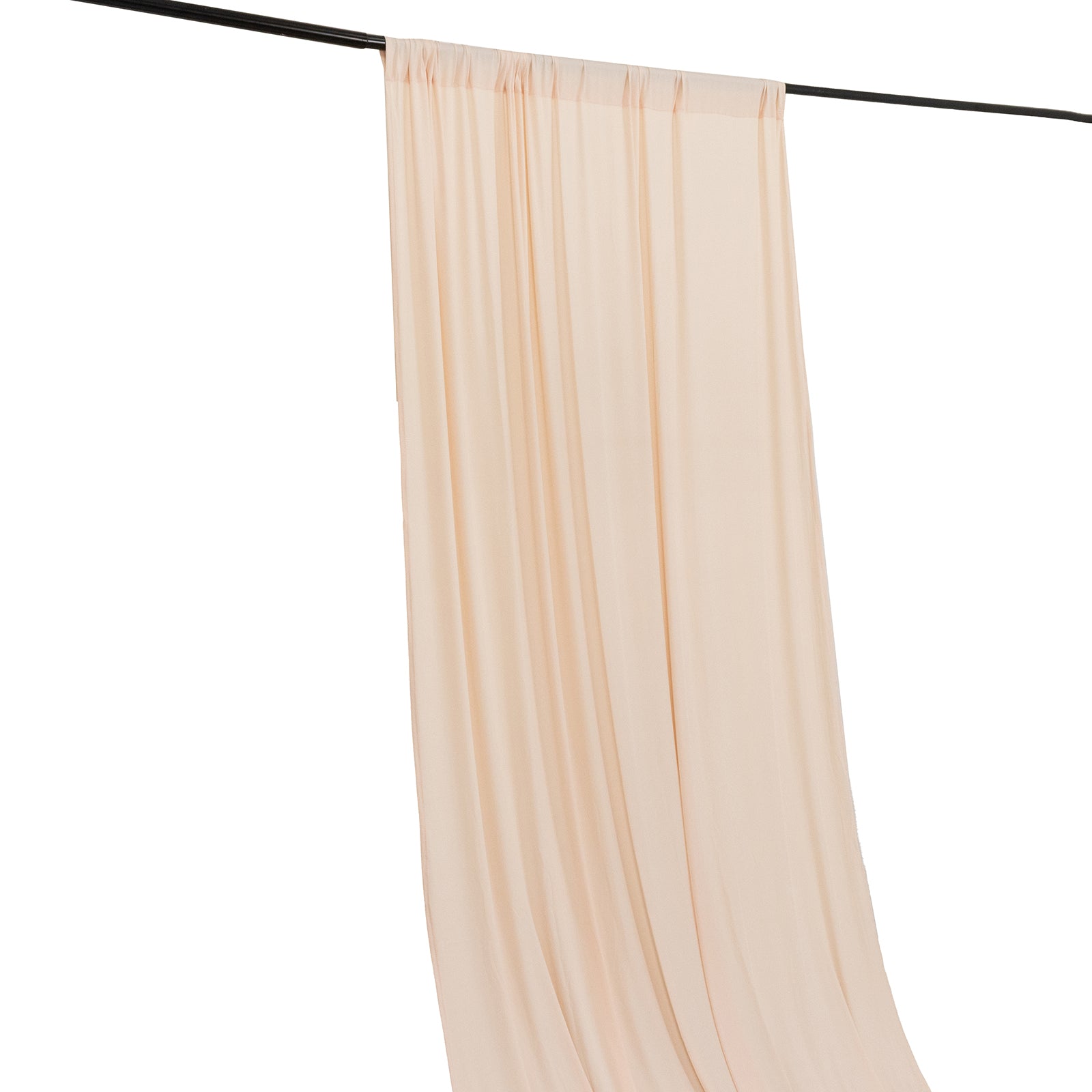 Blush 4-way stretch spandex event curtain drapes hanging from a rod.