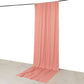Dusty rose 4-way stretch spandex event curtain drapes on a rod.