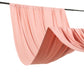 Dusty rose 4-way stretch spandex event curtain drapes hanging on a rod.