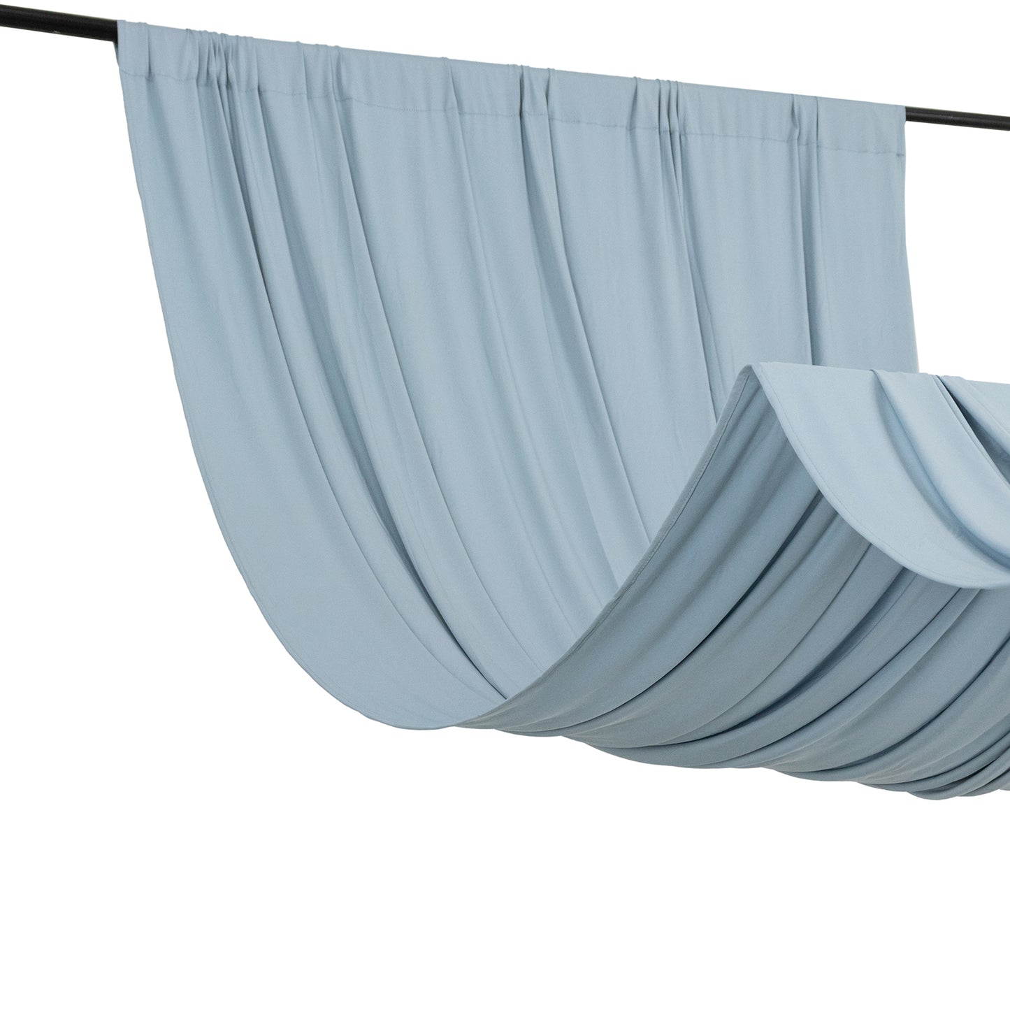 Dusty blue 4-way stretch spandex event curtain drapes hanging elegantly.