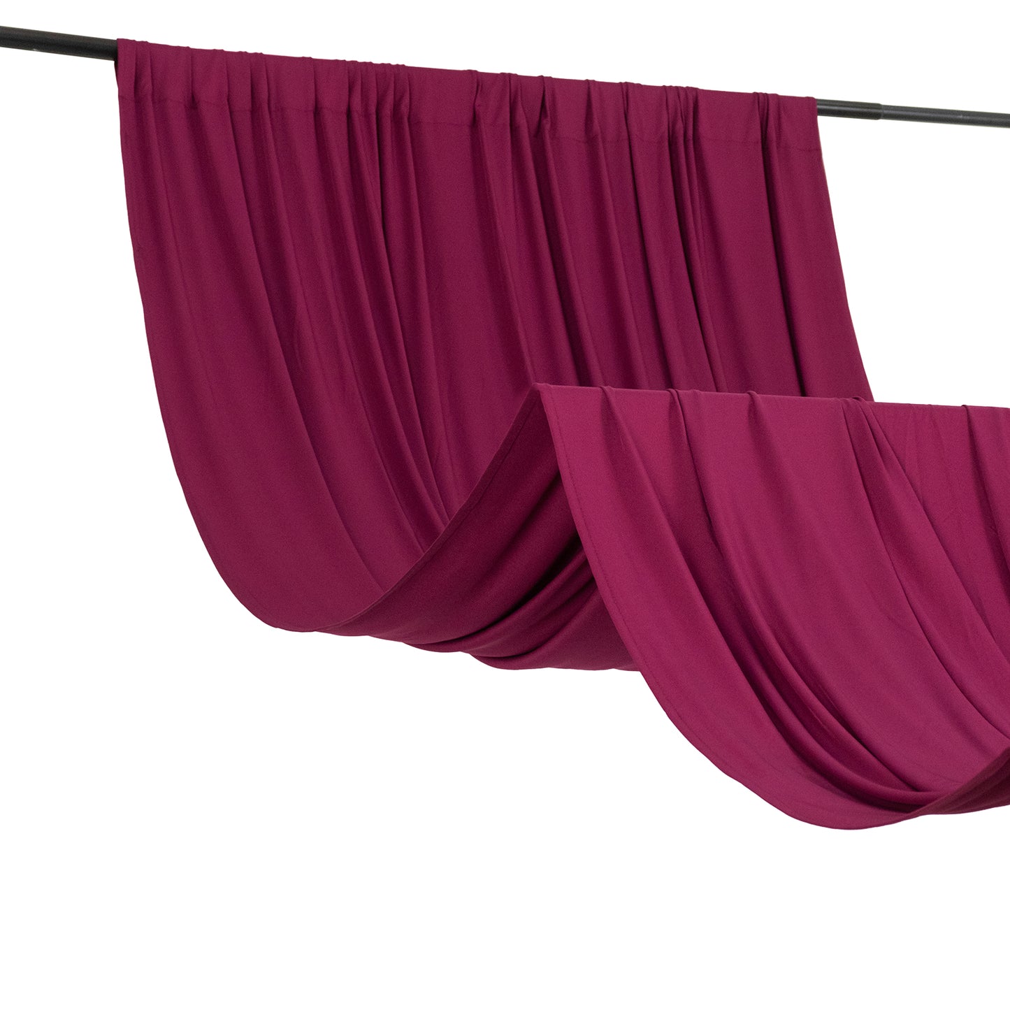 Burgundy 4-way stretch spandex event curtain drapes hanging on a rod.