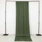 Dusty sage green 4-way stretch spandex event curtain drapes on a display frame.