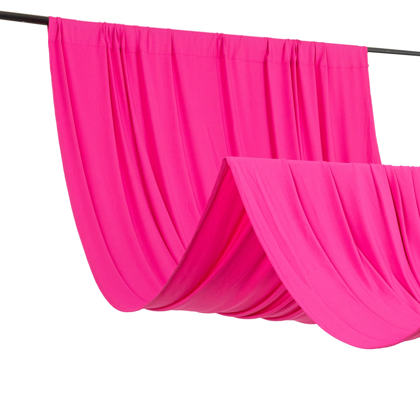 Fuchsia 4-way stretch spandex event curtain drapes hanging gracefully.