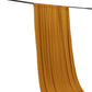 Gold 4-way stretch spandex event curtain drapes hanging on a rod.