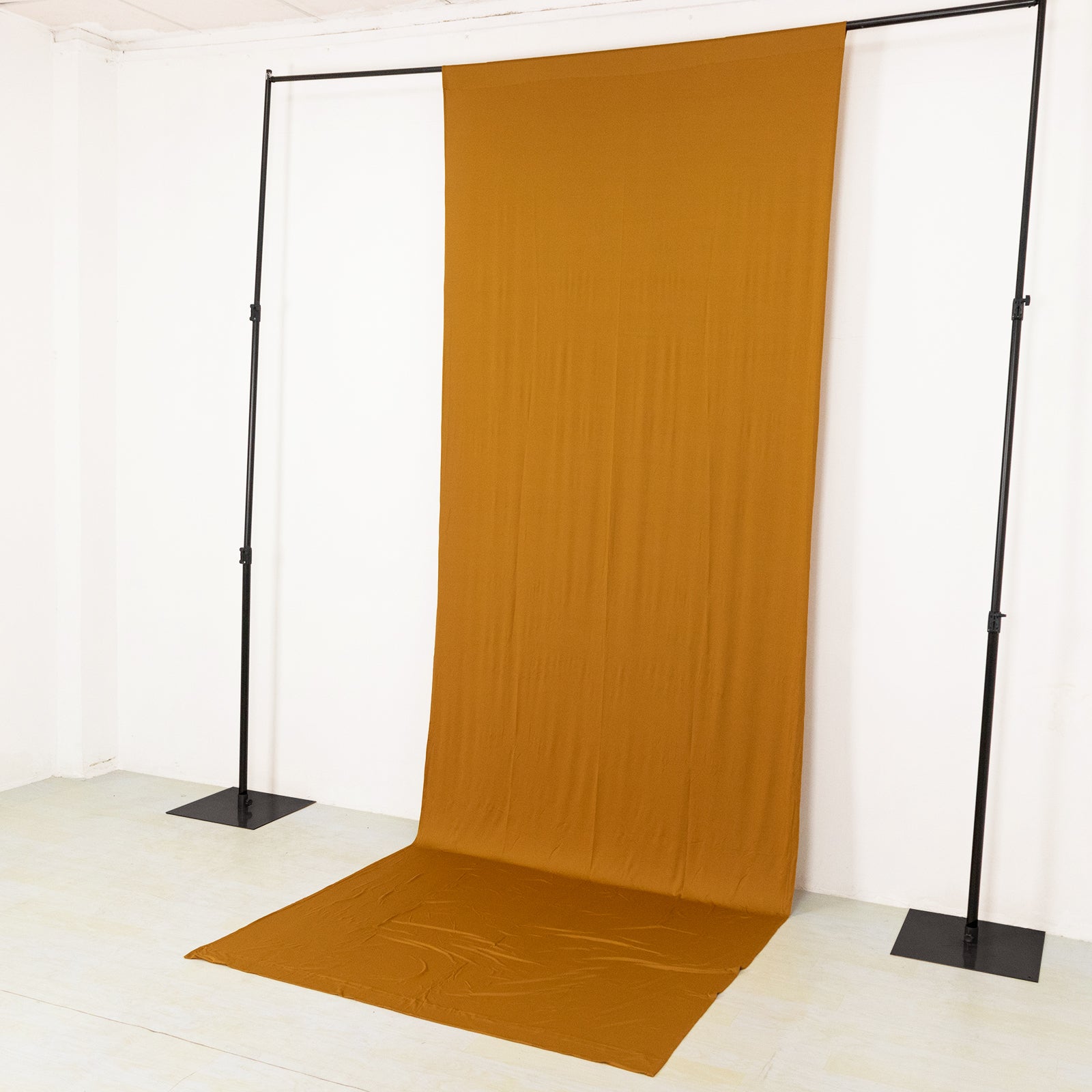 Gold 4-way stretch spandex event curtain drapes backdrop panel.