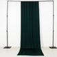 Emerald green 4-way stretch spandex event curtain drapes on a backdrop stand.