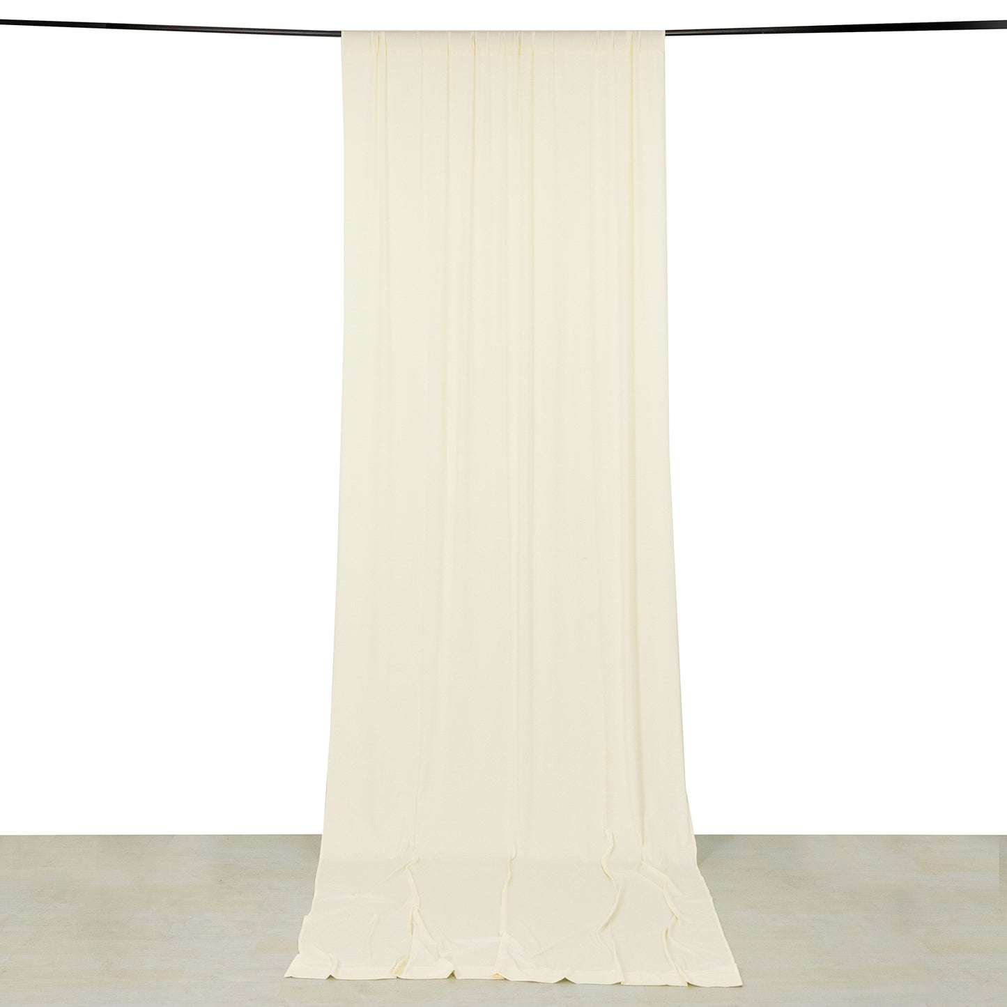Ivory 4-way stretch spandex event curtain drape hanging from a rod.