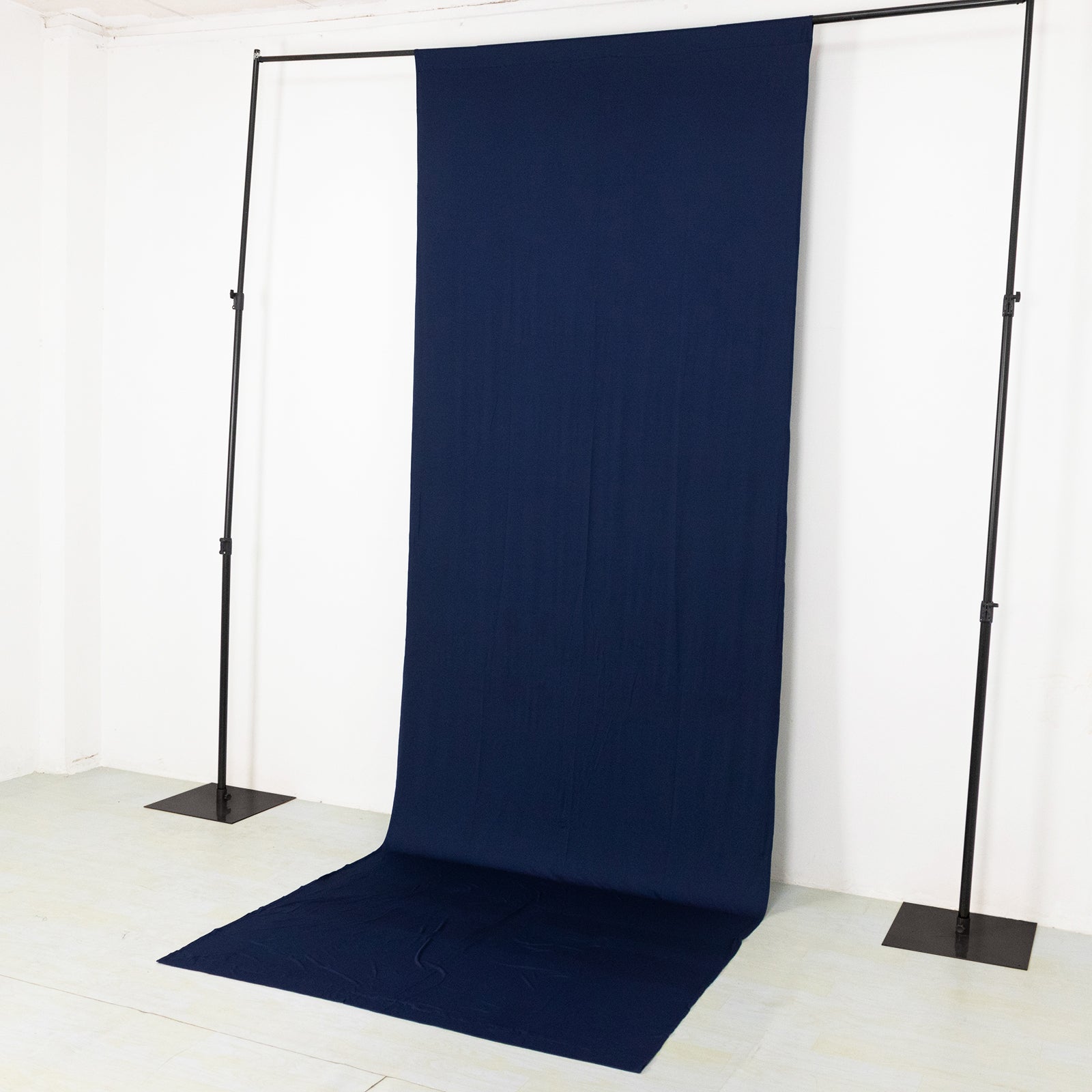 Navy blue 4-way stretch spandex event curtain drapes backdrop panel.