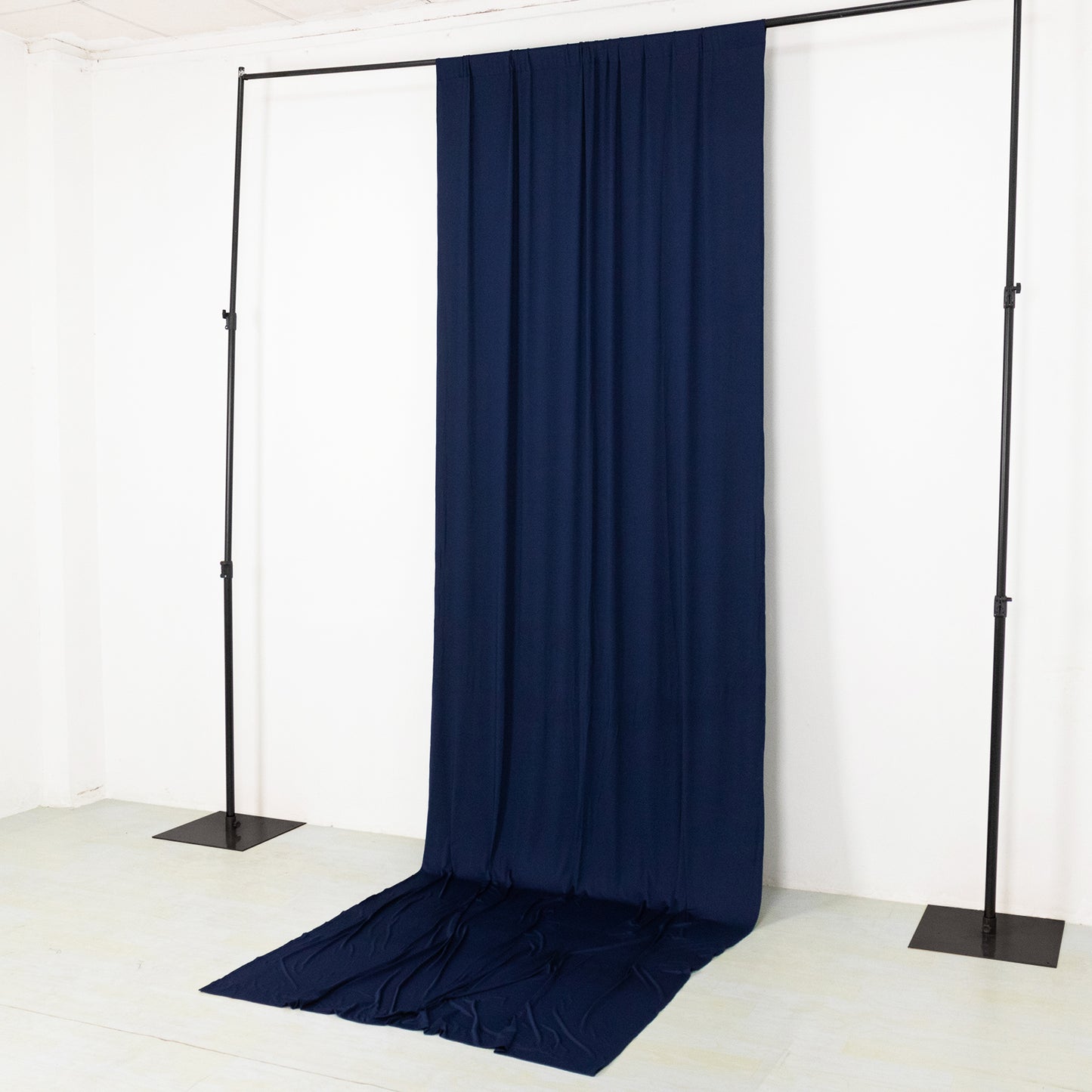 Navy blue 4-way stretch spandex event curtain drapes backdrop panel.