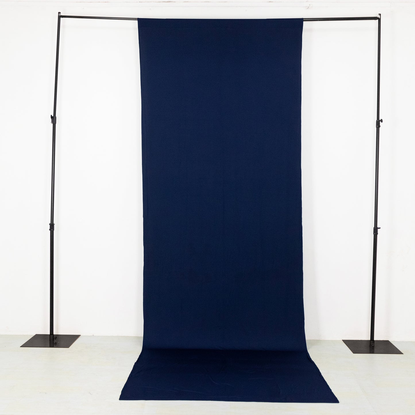 Navy blue 4-way stretch spandex event curtain drapes backdrop panel.