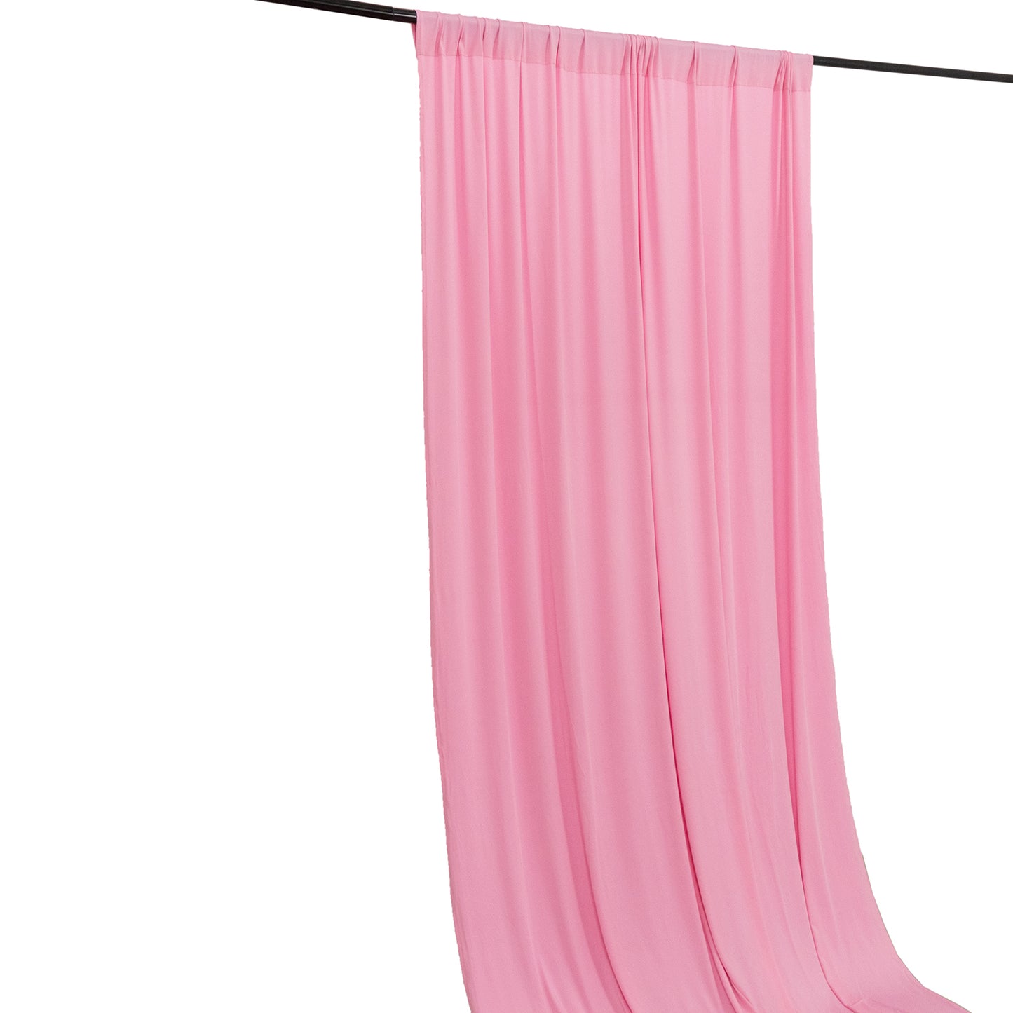 Pink 4-way stretch spandex event curtain drapes hanging on a rod.