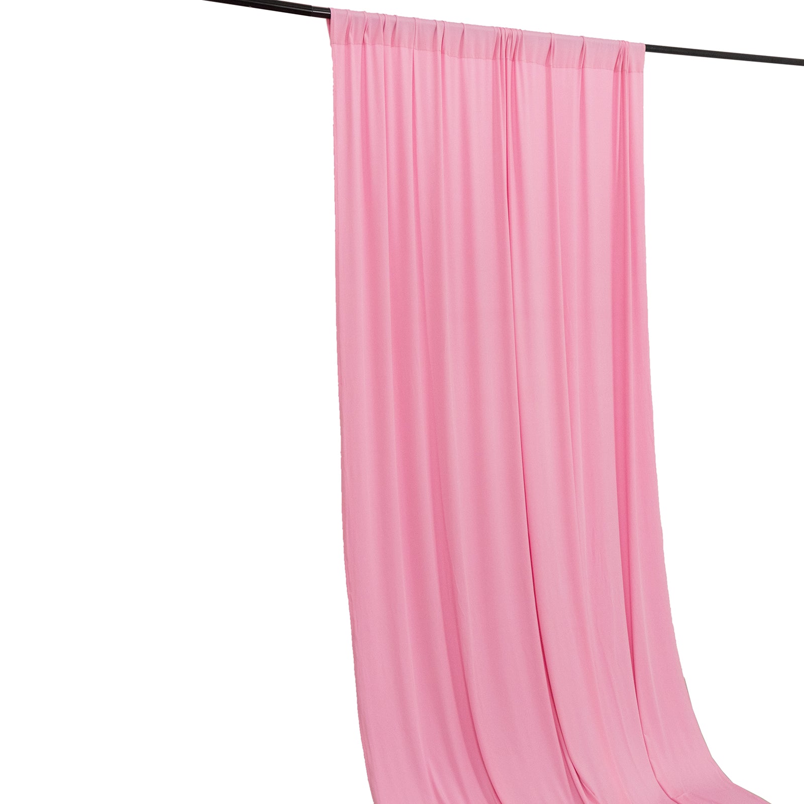 Pink 4-way stretch spandex event curtain drapes hanging on a rod.