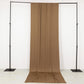Taupe 4-way stretch spandex event curtain drapes on a backdrop stand.