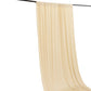 Beige 4-way stretch spandex event curtain drapes hanging from a rod.