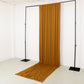 Gold 4-way stretch spandex drape backdrop on a black frame.