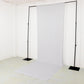White 4-way stretch spandex event curtain drapes on a backdrop stand.