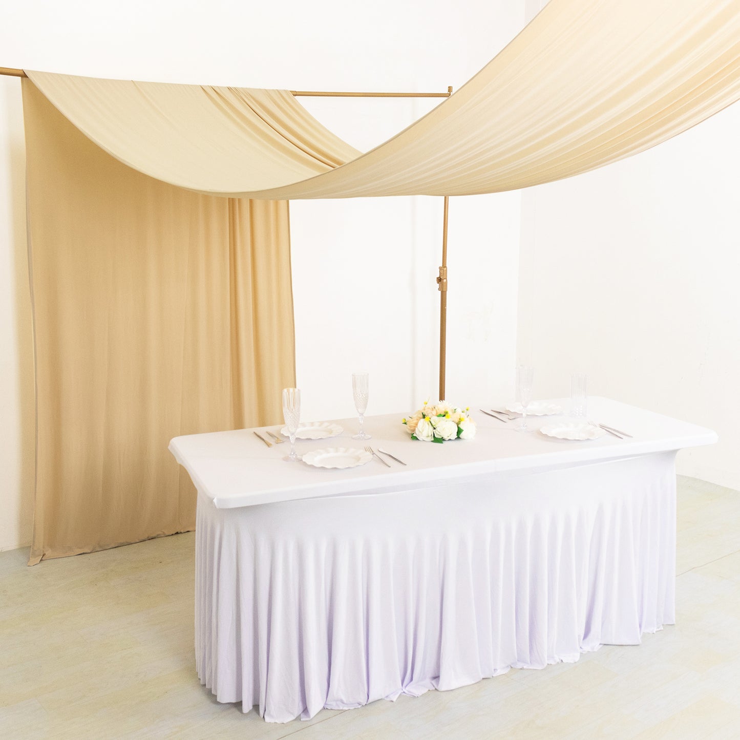 Beige 4-way stretch spandex event curtain drapes backdrop panel.