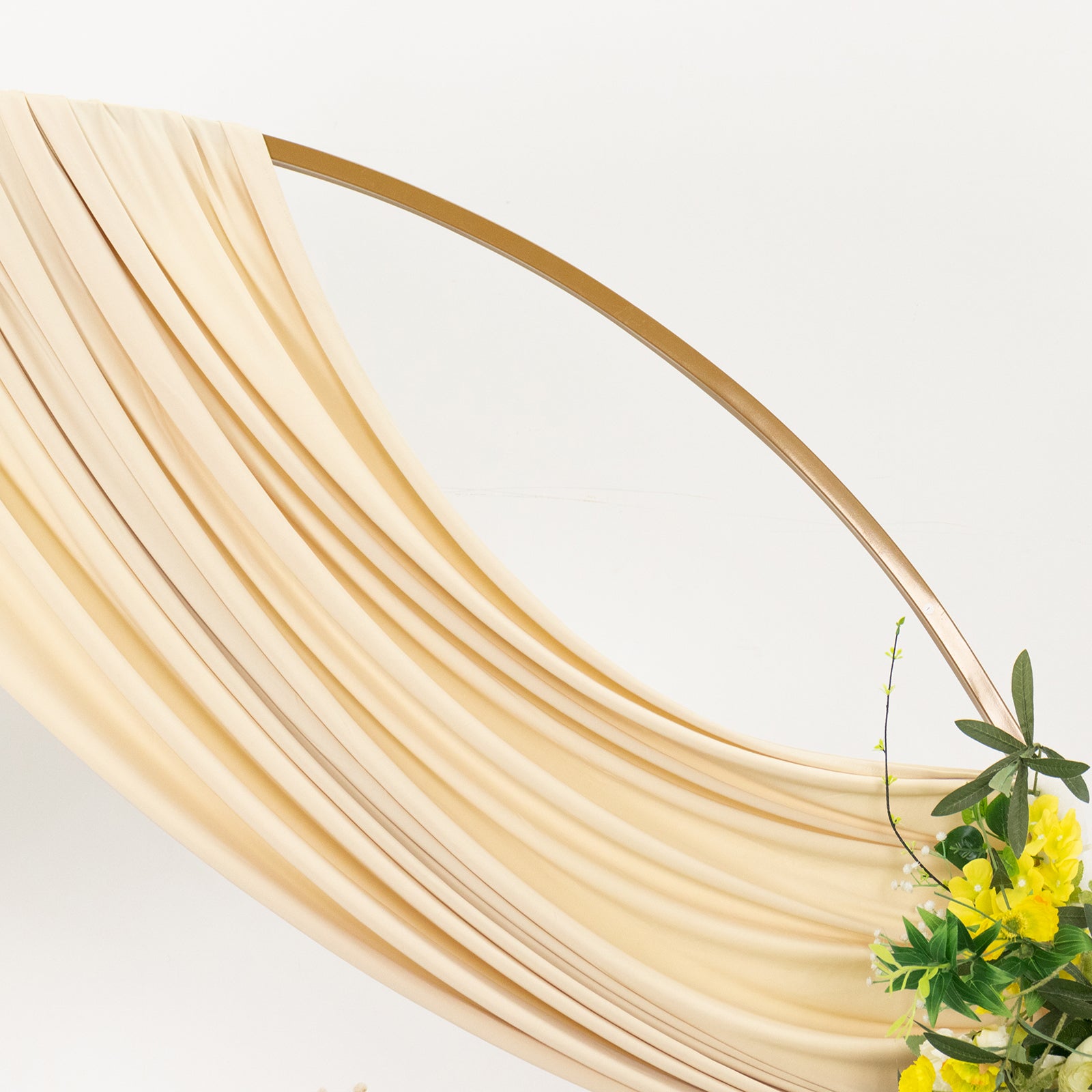 Beige 4-way stretch spandex event curtain drapes with rod pockets.