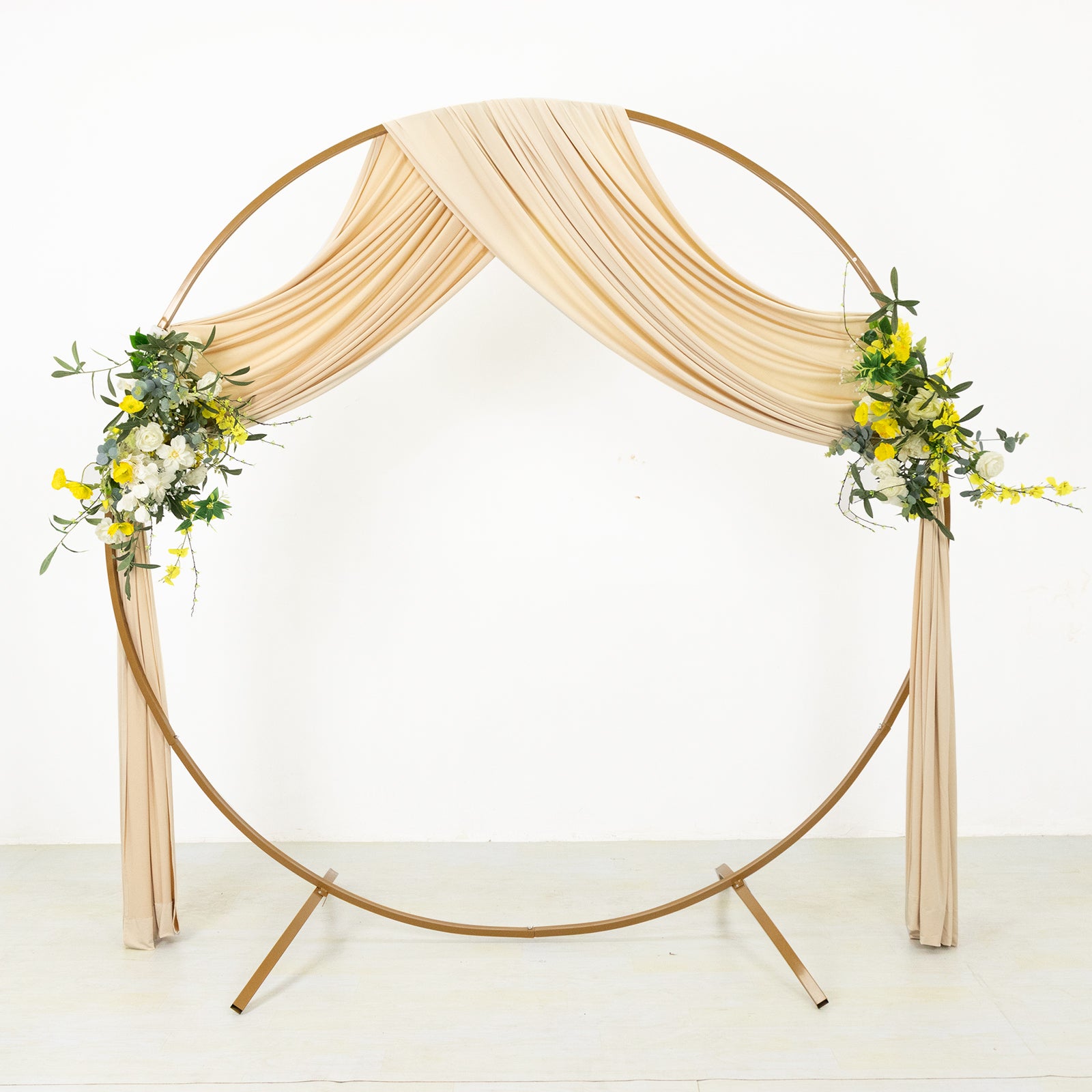 Beige 4-way stretch spandex event curtain drapes with floral accents.