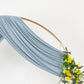 Dusty blue 4-way stretch spandex event curtain drapes with rod pockets.
