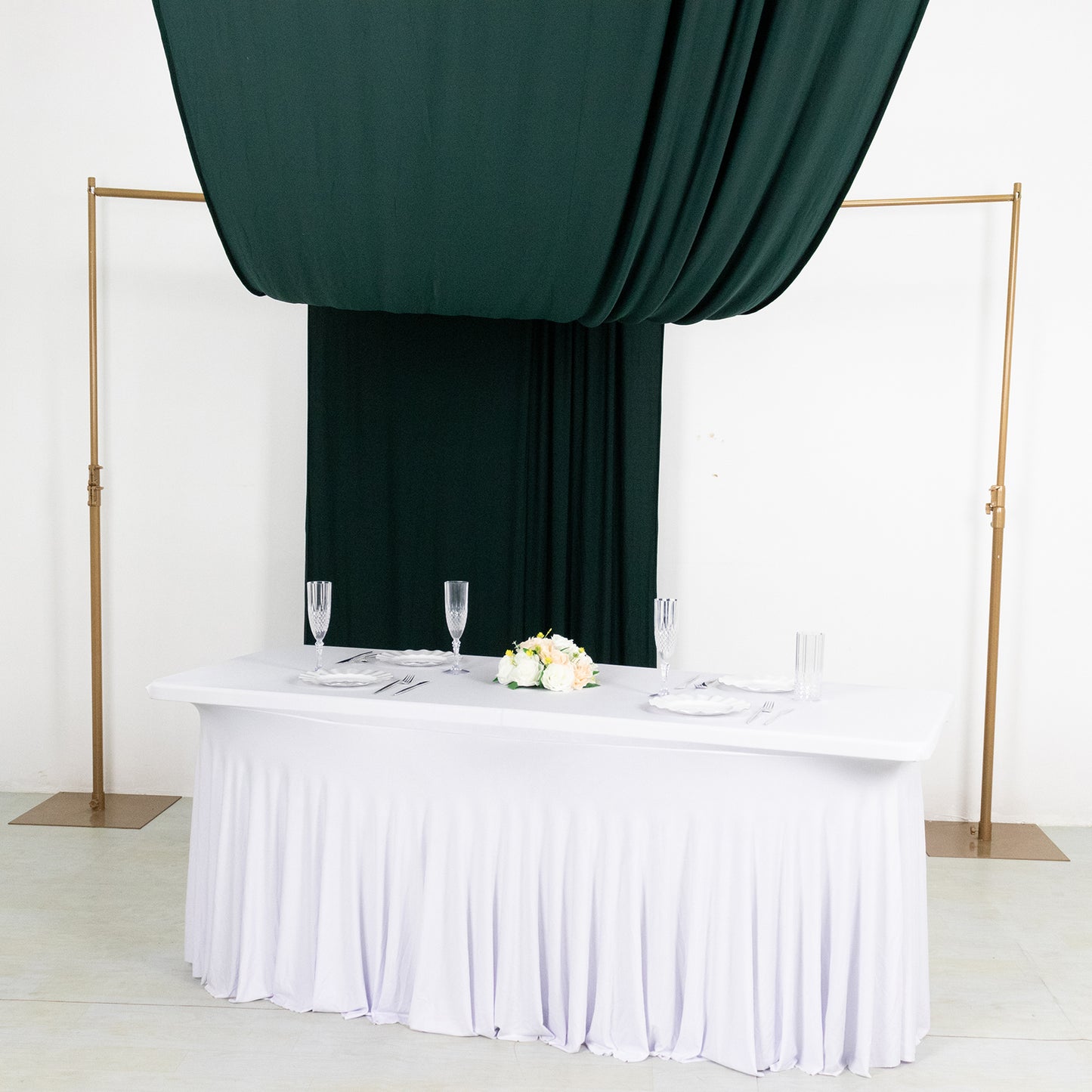 Emerald green 4-way stretch spandex event curtain drapes with rod pockets.