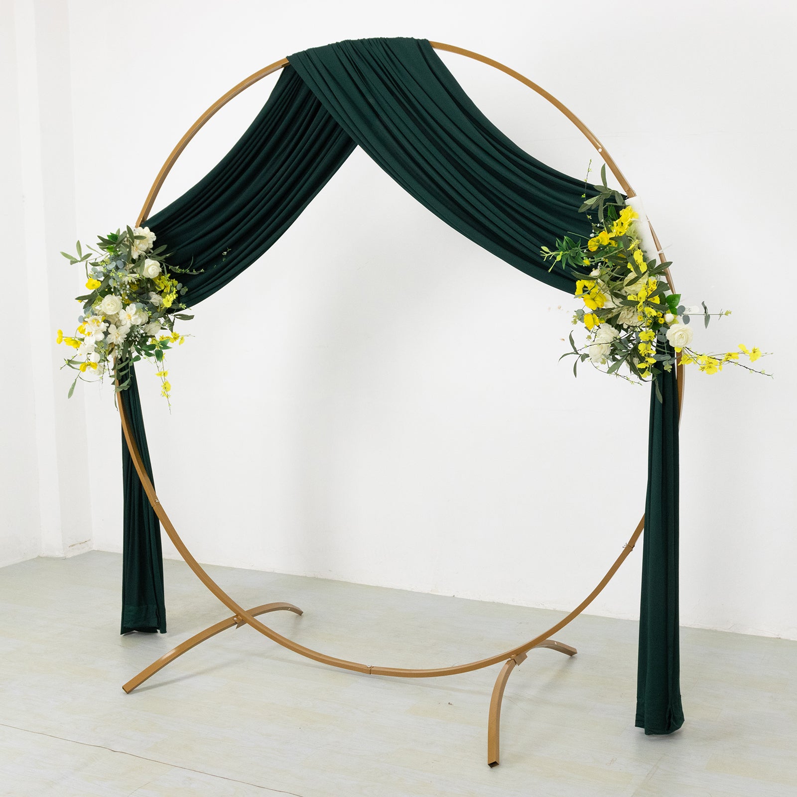 Emerald green 4-way stretch spandex event curtain drapes with floral accents.