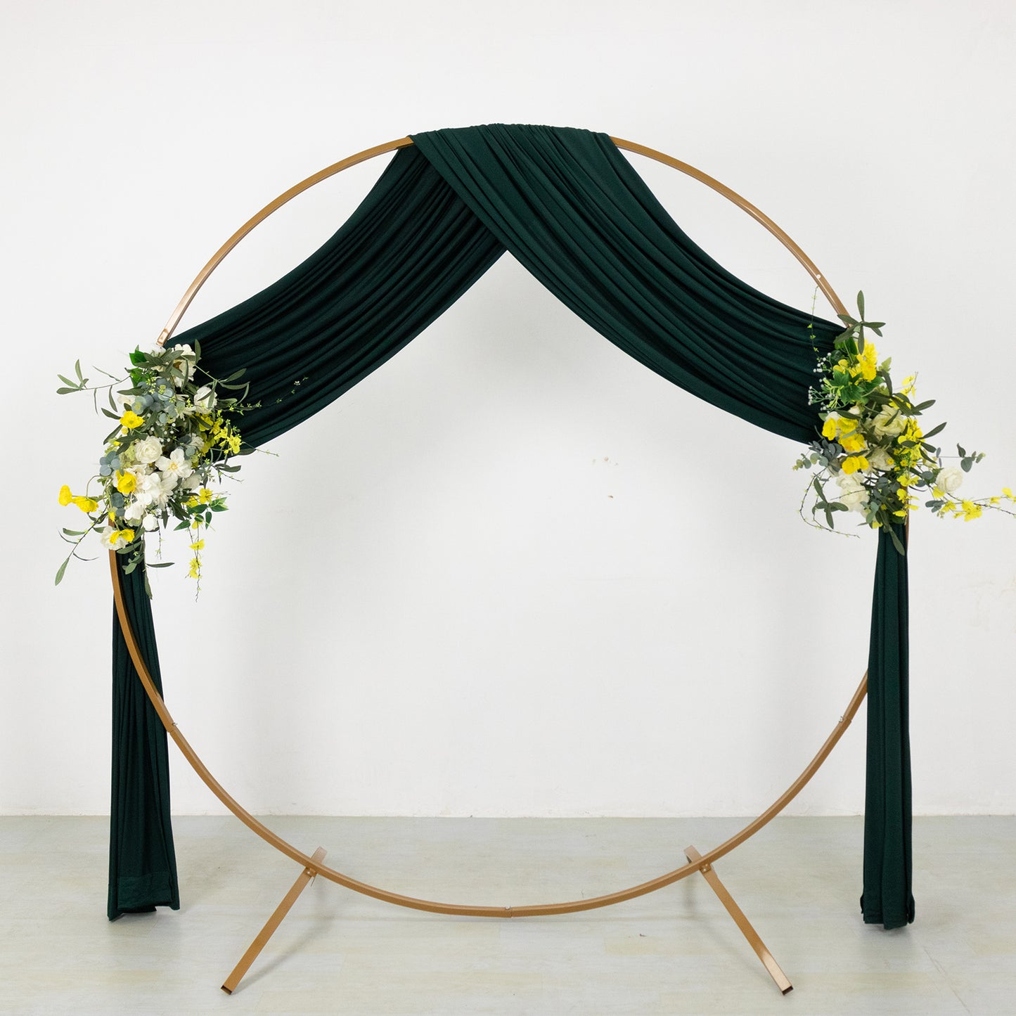Emerald green 4-way stretch spandex event curtain drapes with floral accents.