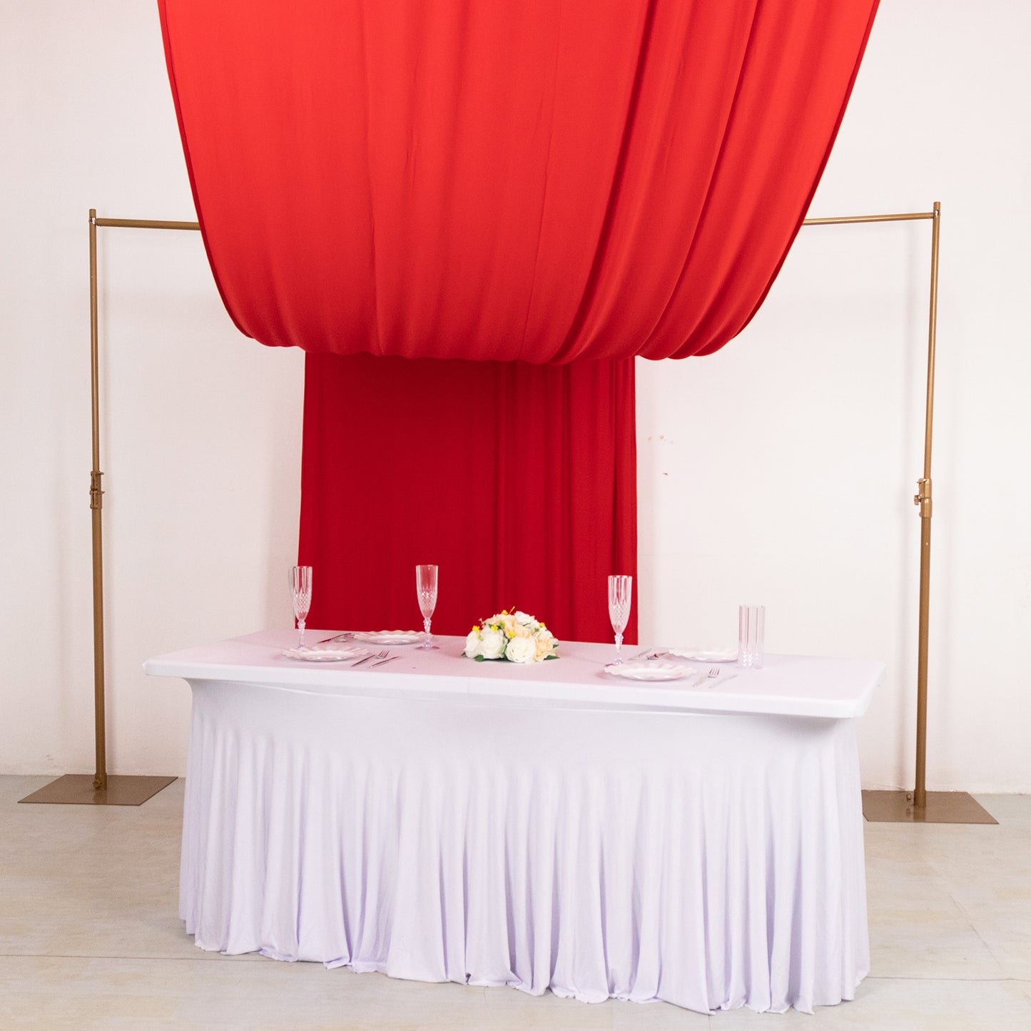 Red 4-way stretch spandex event curtain drapes backdrop.