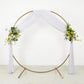White 4-way stretch spandex event curtain drapes with floral arrangement.