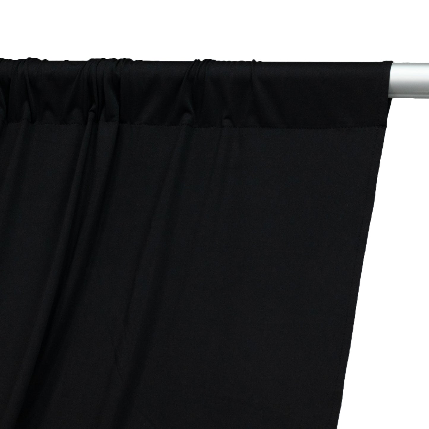 Black 4-way stretch spandex event curtain drapes with rod pockets.