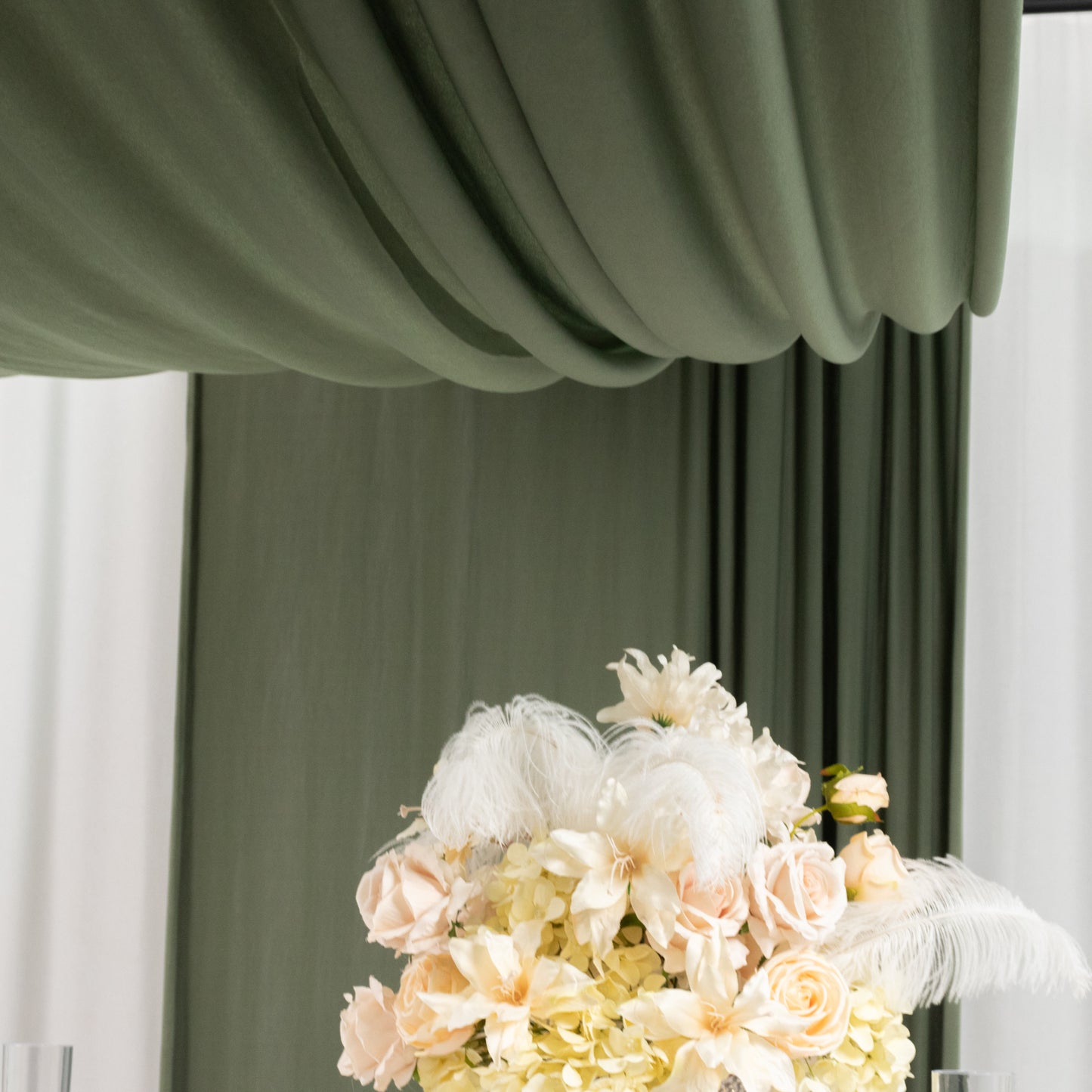 Dusty sage green 4-way stretch spandex event curtain drapes with rod pockets.