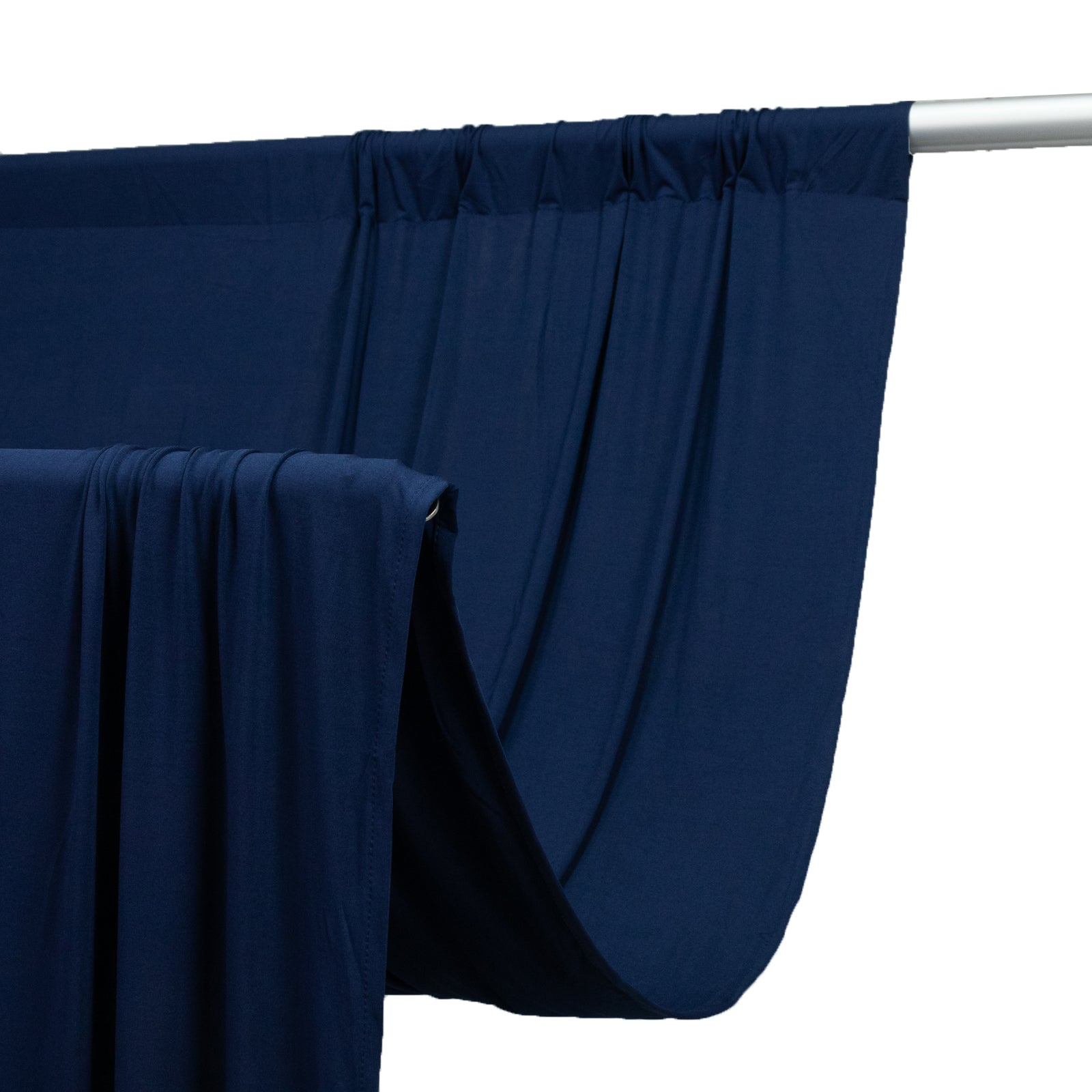 Navy blue 4-way stretch spandex event curtain drapes on a rod.