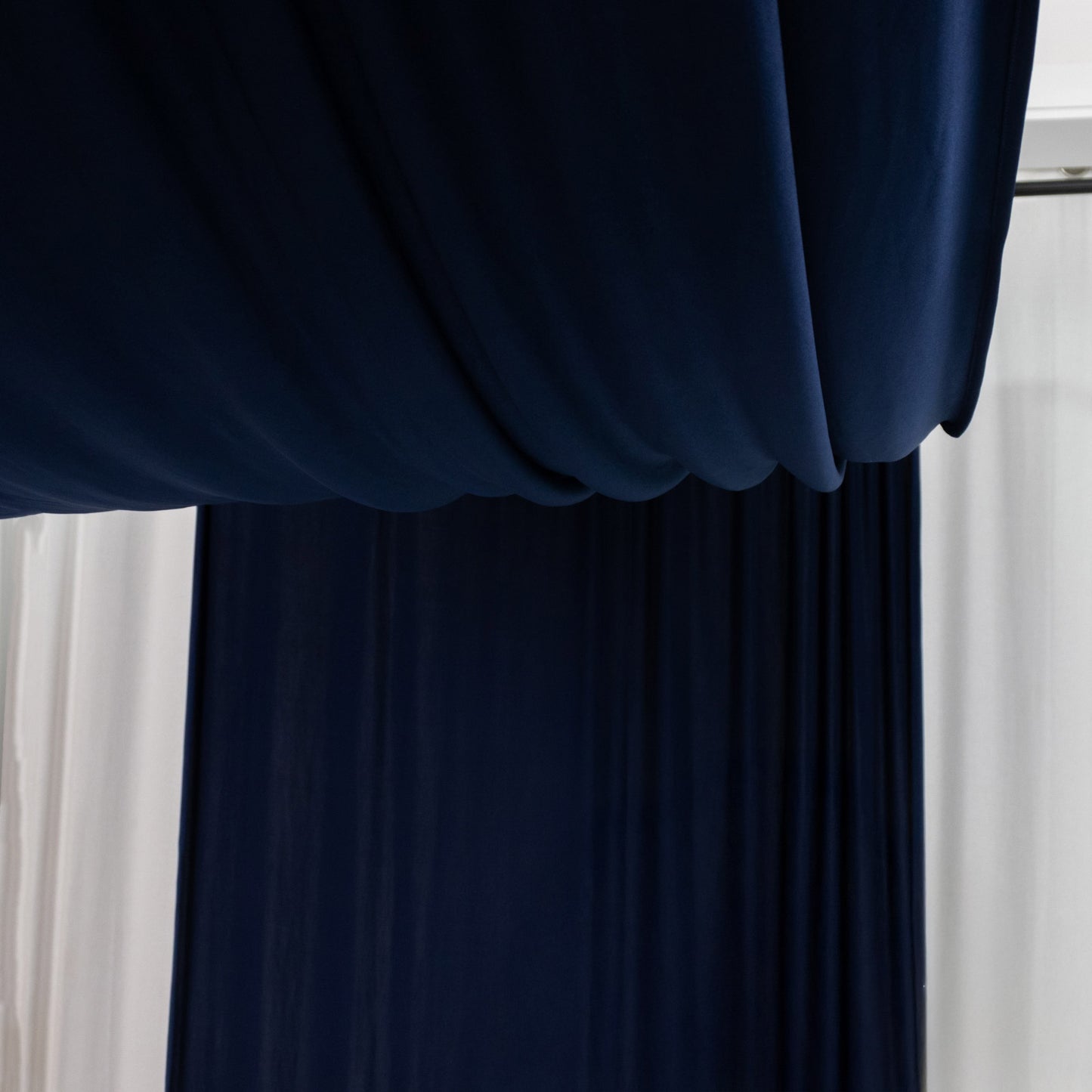 Navy blue 4-way stretch spandex event curtain drapes.