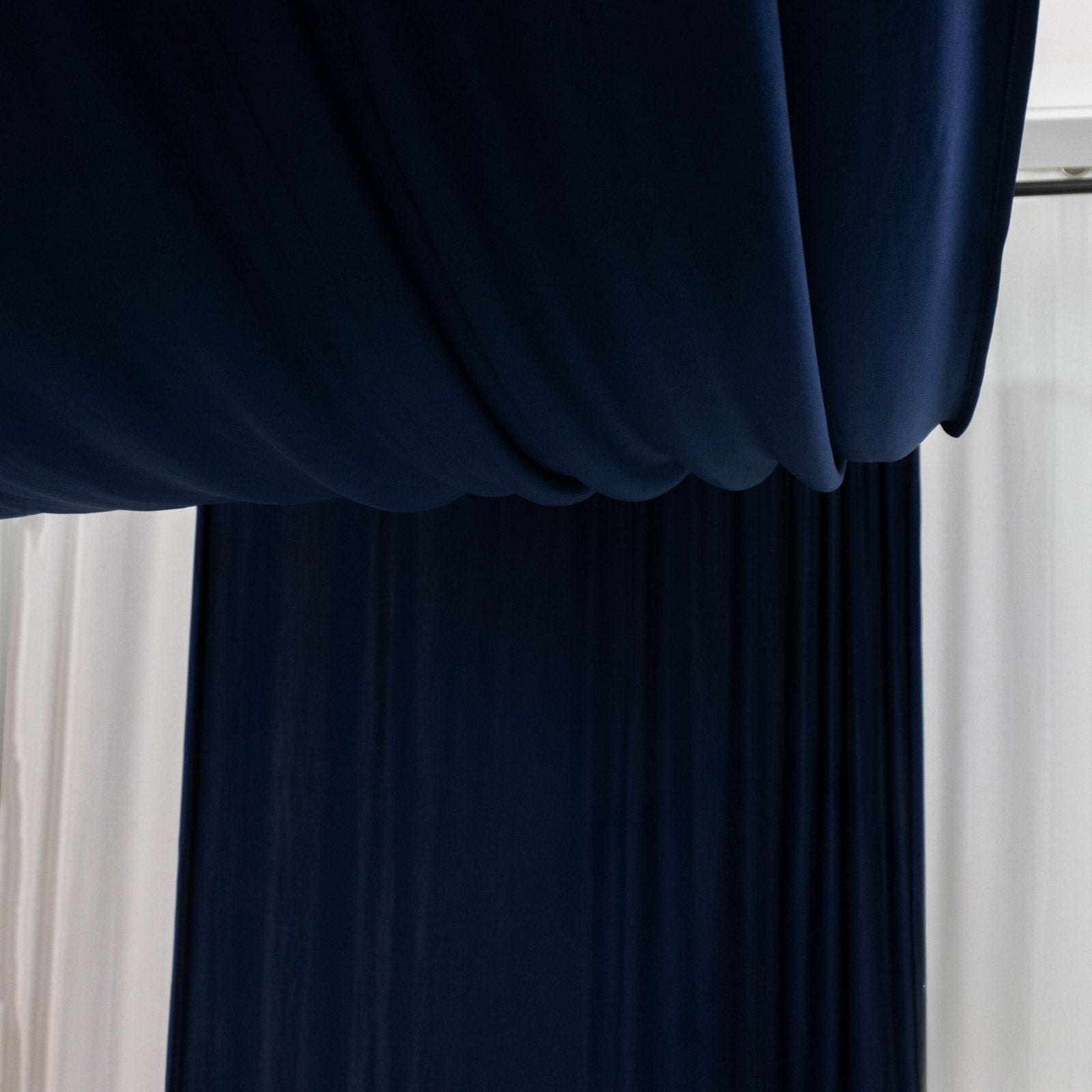 Navy blue 4-way stretch spandex event curtain drapes.