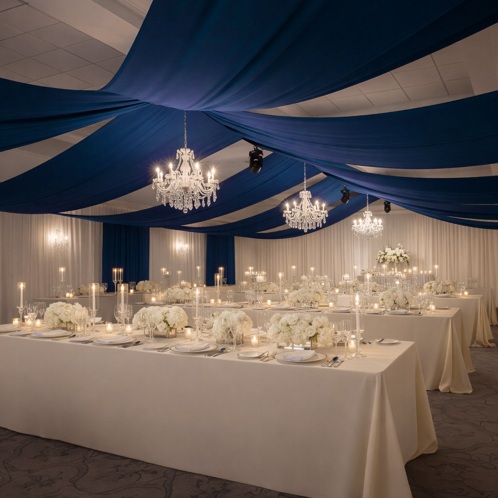 Navy blue 4-way stretch spandex event curtain drapes in elegant venue setting.